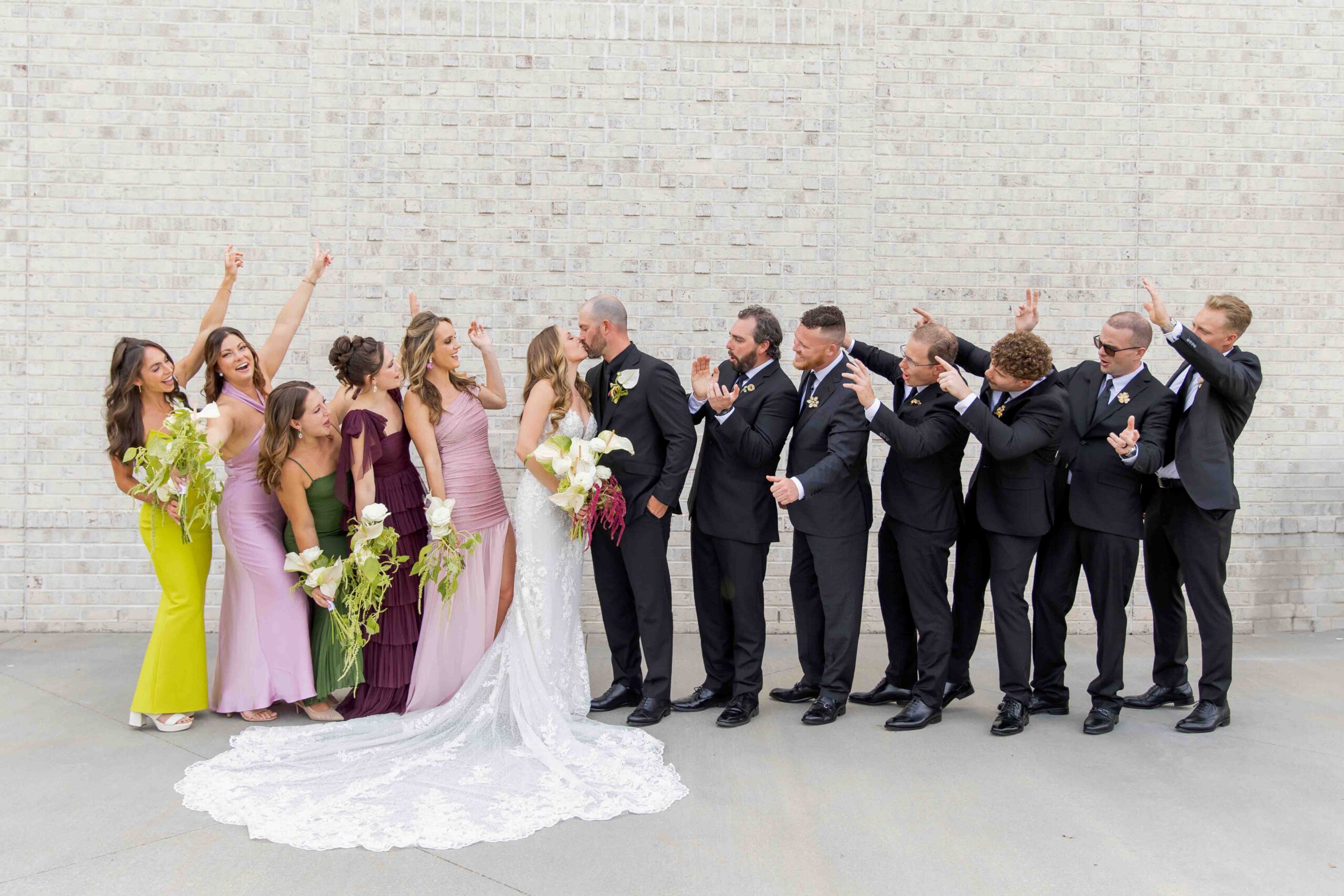 Bride and groom and their bridal party at The Maxwell Raleigh wedding venue photographed by Moments by Hiba.