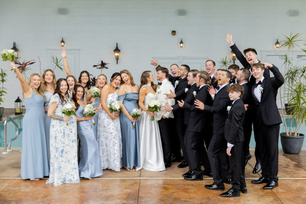 Bridal party celebrating the couple during their group photos in Raleigh NC.